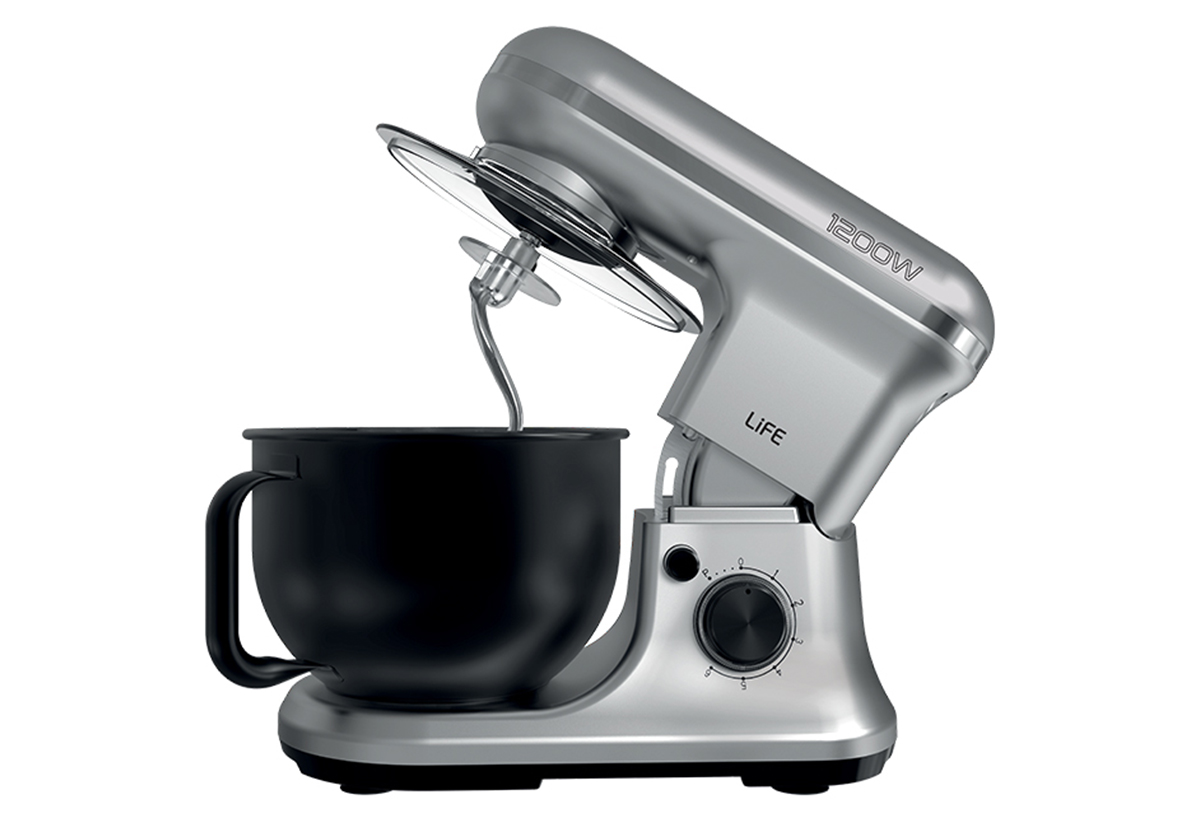 Απεικονίζεται η κουζινομηχανή ανασηκωμένη.